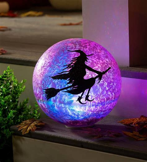 Illuminate Your Halloween Decor with the Light Up Witch with Birds Halloween Wall Art